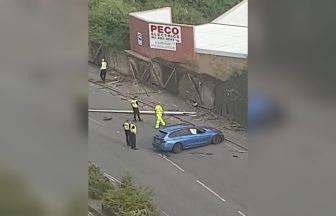 Car mows down two lampposts on busy Dundee road before driver flees scene