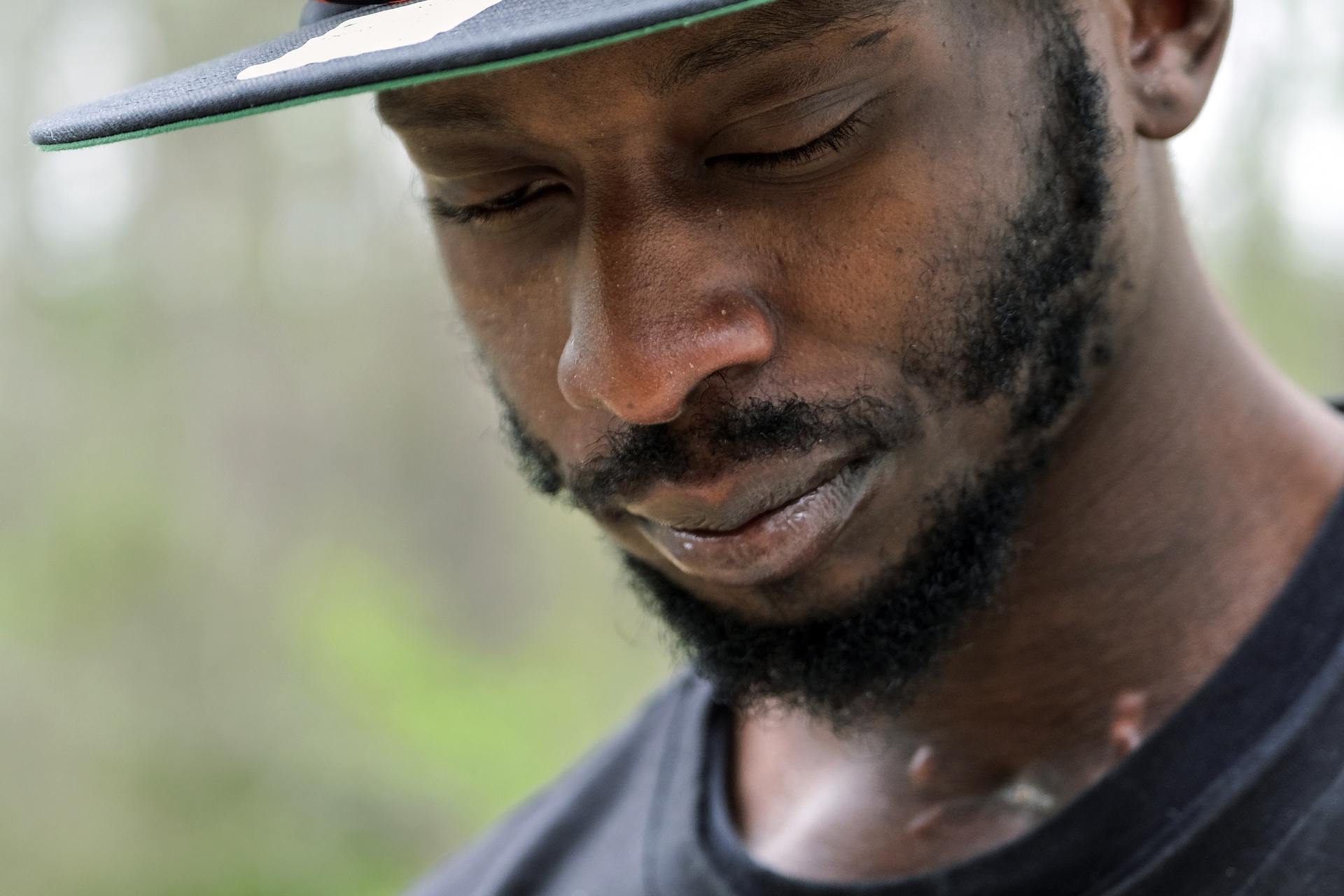 Michael Corey Jenkins stands outside Taylor Hill Church.