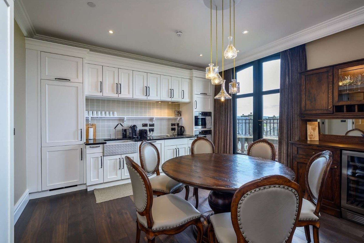 The entrance to the apartment leads into the living room and kitchen.