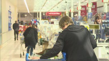 Grocery price inflation falls but shoppers still forking out for essentials, figures show