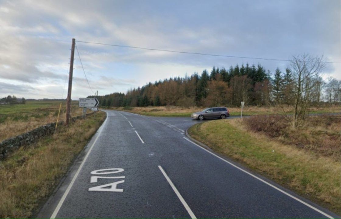 Two people rushed to hospital after crash between car and motorbike in West Calder