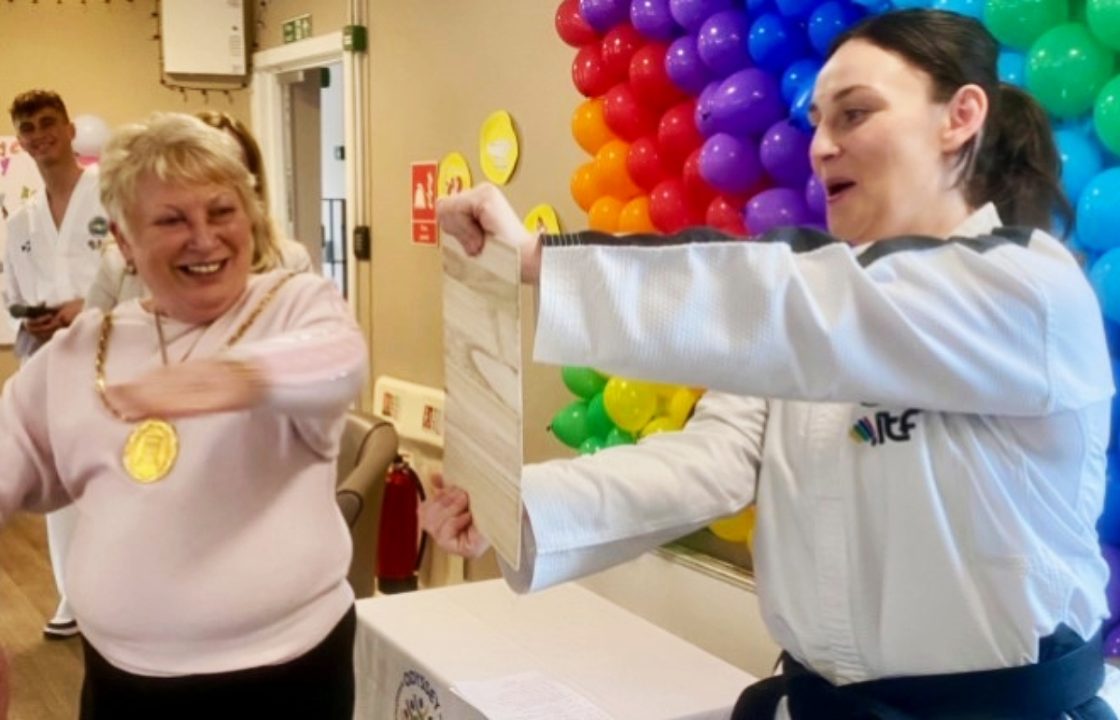 Care home residents earn yellow belts in taekwondo