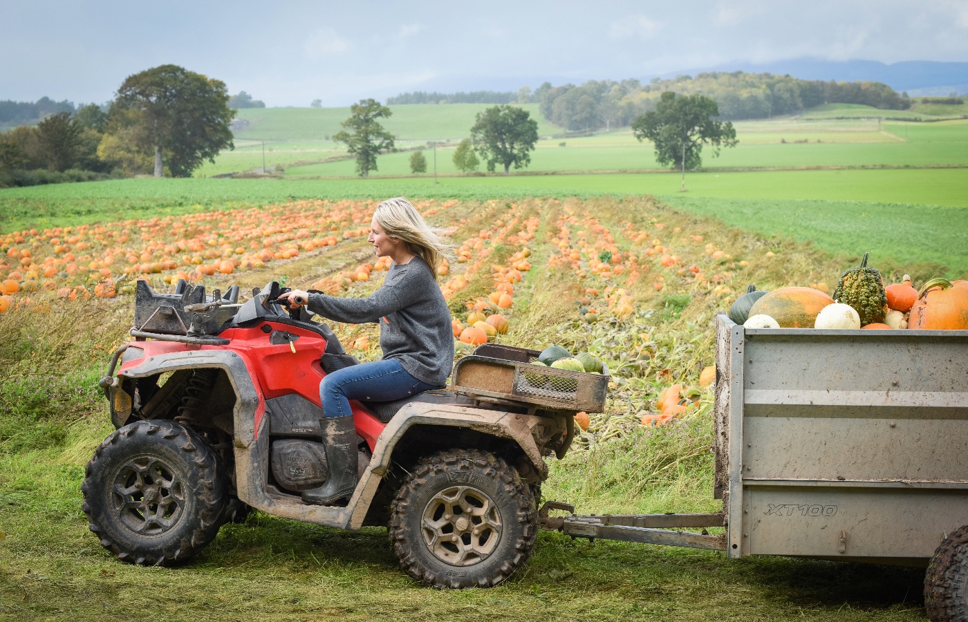 Rebecca McEwen on her quad bike at Arnprior Farm.