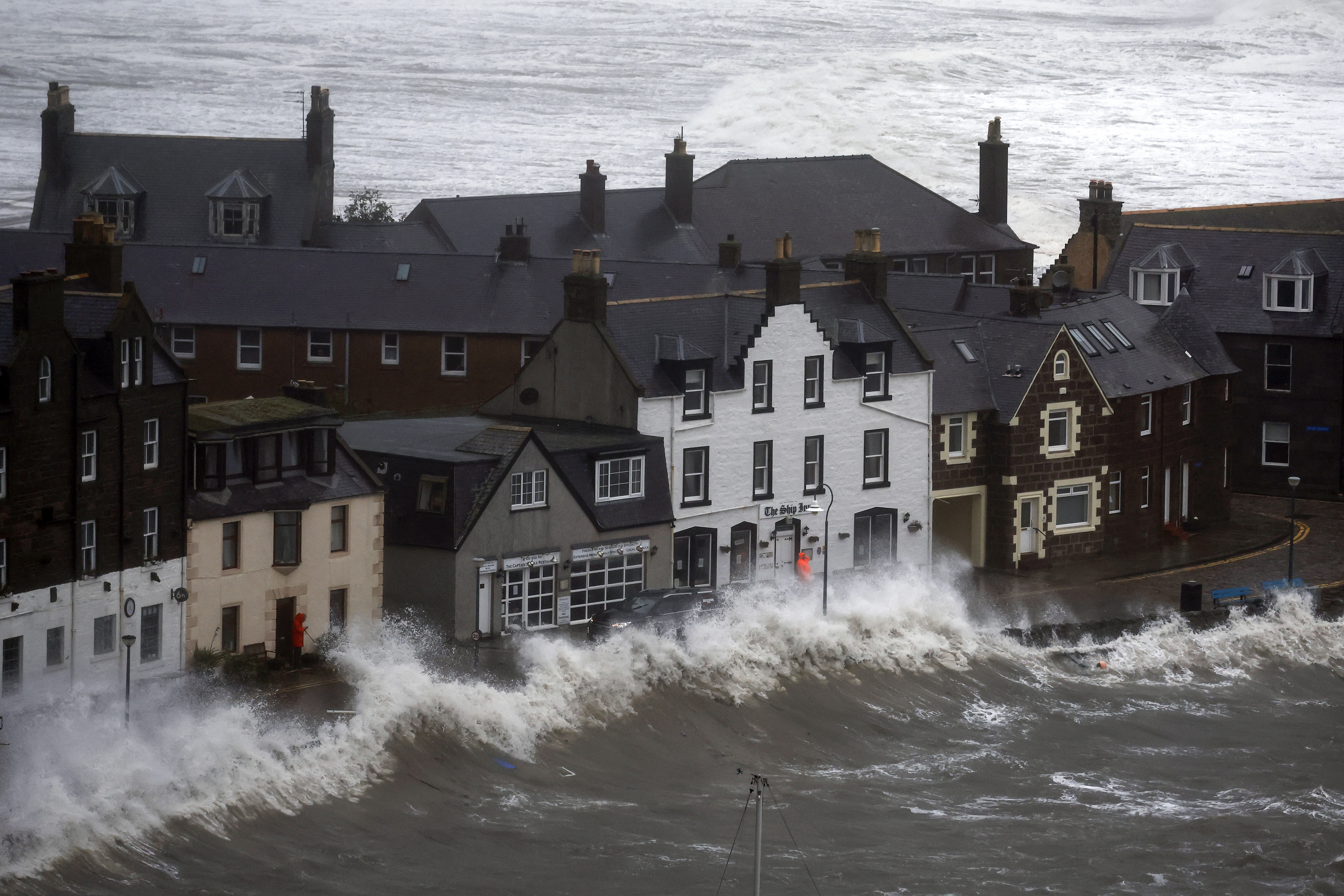 Waves crash over the harbour on October 19 in Stonehaven.