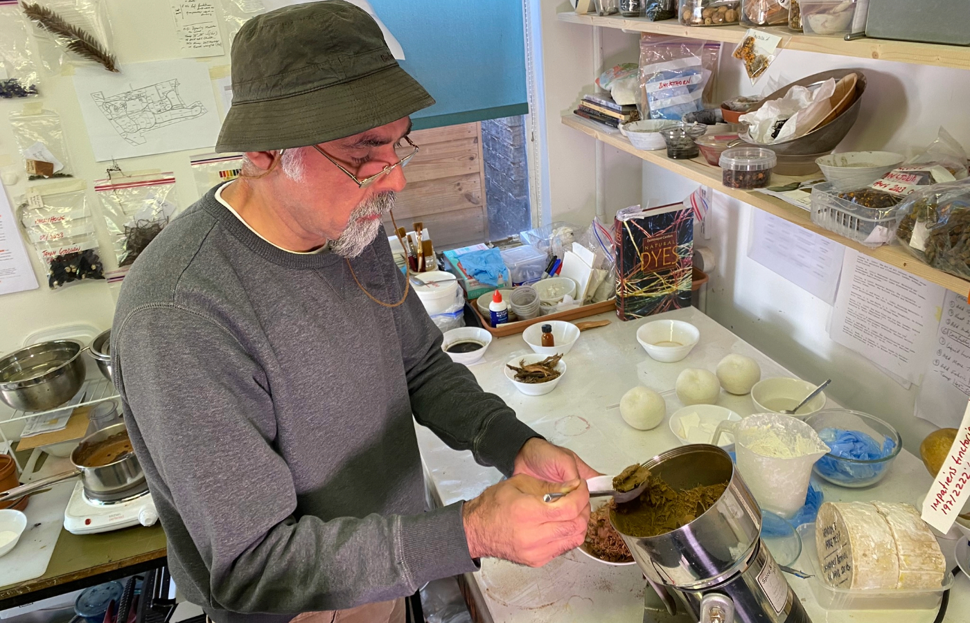 Artist Nabil Ali works with the bark in his workshop (Louise Walsh/PA)