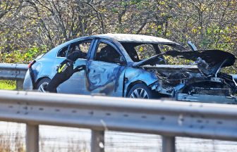 M8 closed with man arrested after car bursts into flames near Glasgow Airport