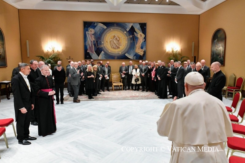 Pope Francis greets Celtic players and staff.