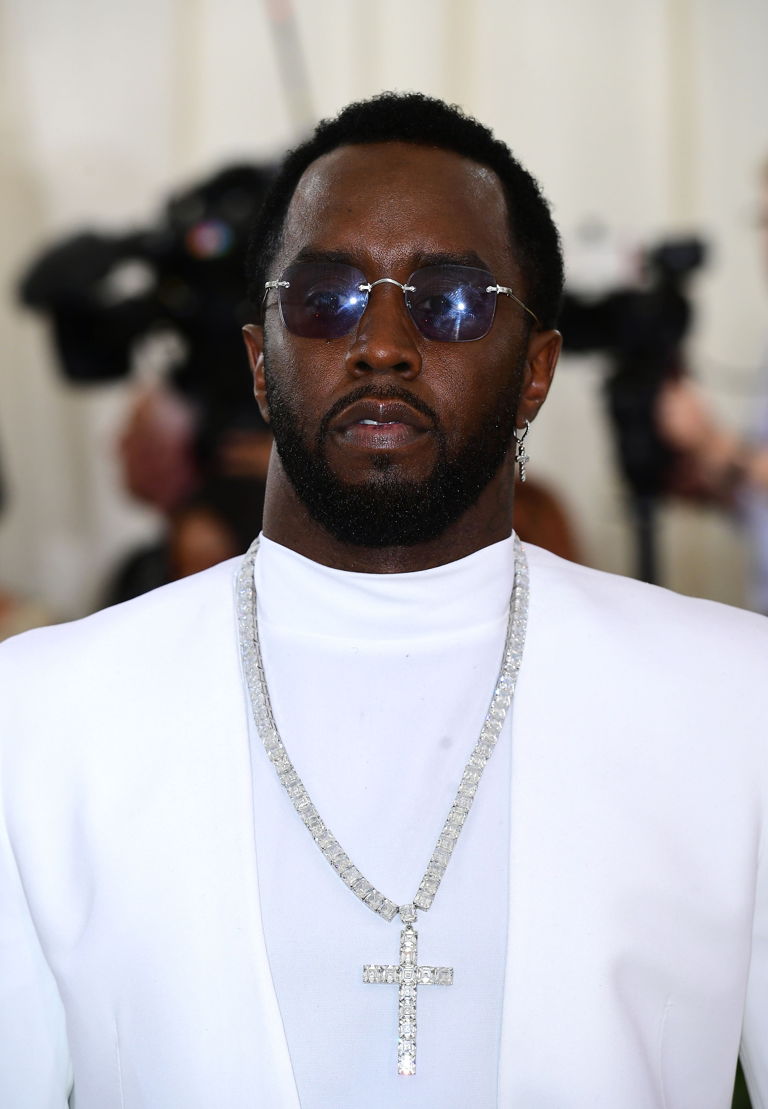 Sean Combs has settled a lawsuit with former partner Cassie.