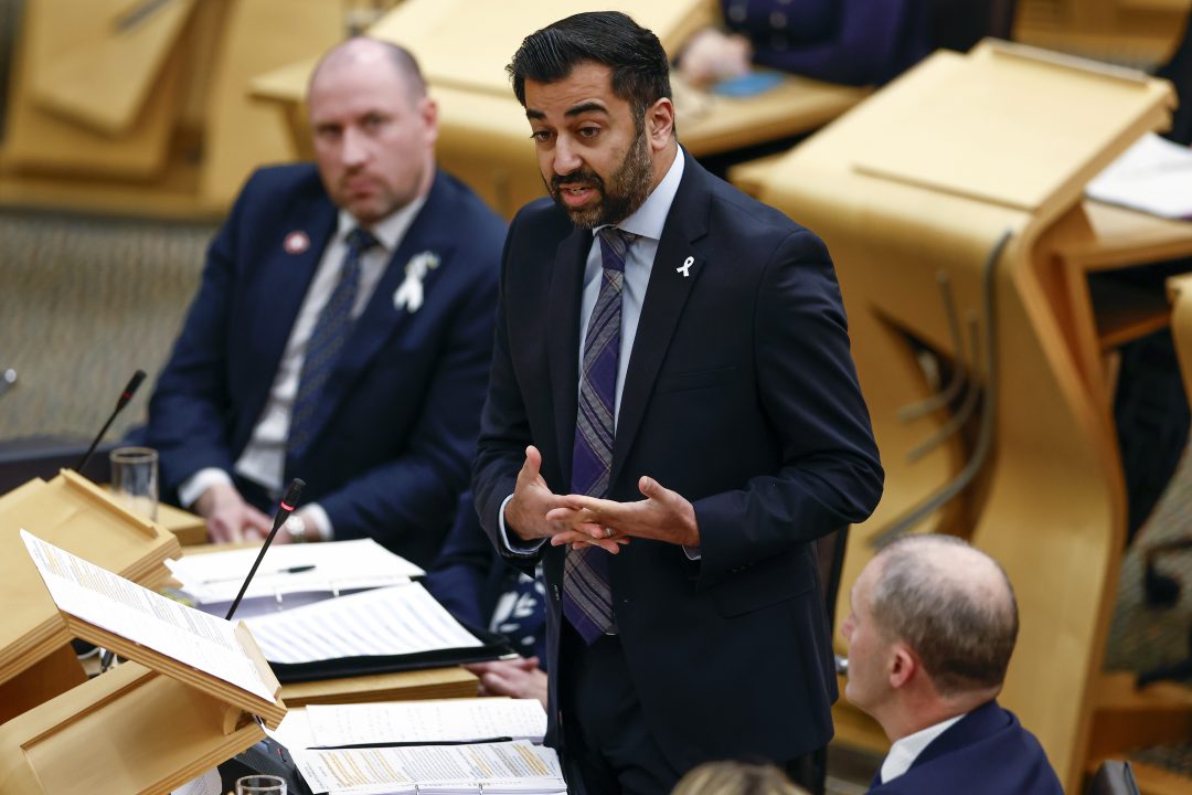 EDINBURGH, SCOTLAND - DECEMBER 07: Scottish First Minister Humza Yousaf answers questions during First Minister's Questions at Scottish Parliament on December 07, 2023 in Edinburgh, Scotland. (Photo by Jeff J Mitchell/Getty Images)