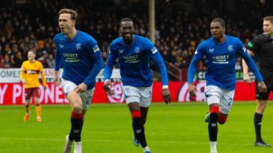 Kieran Dowell on target as Rangers beat Motherwell in wet-and-wild encounter