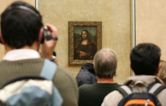 Two people arrested after protesters throw soup at Mona Lisa