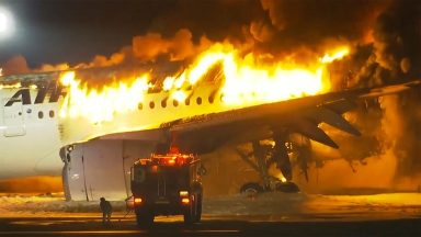 Five Japan coastguard crew reported dead after runway crash with passenger plane at Haneda airport