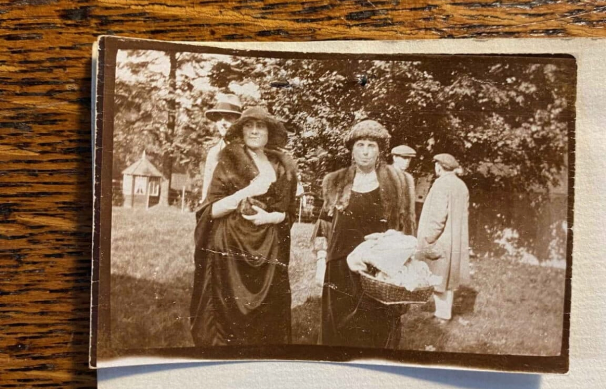 The Queen Mother (left) could possibly be pictured with Mrs Carmichael.