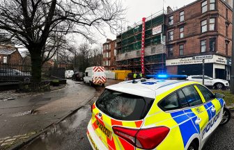 Man appears in court after ‘explosive substances, firearm and drugs’ found in Glasgow raid