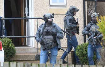 Armed police descend on Tulloch house in Perth as three men arrested