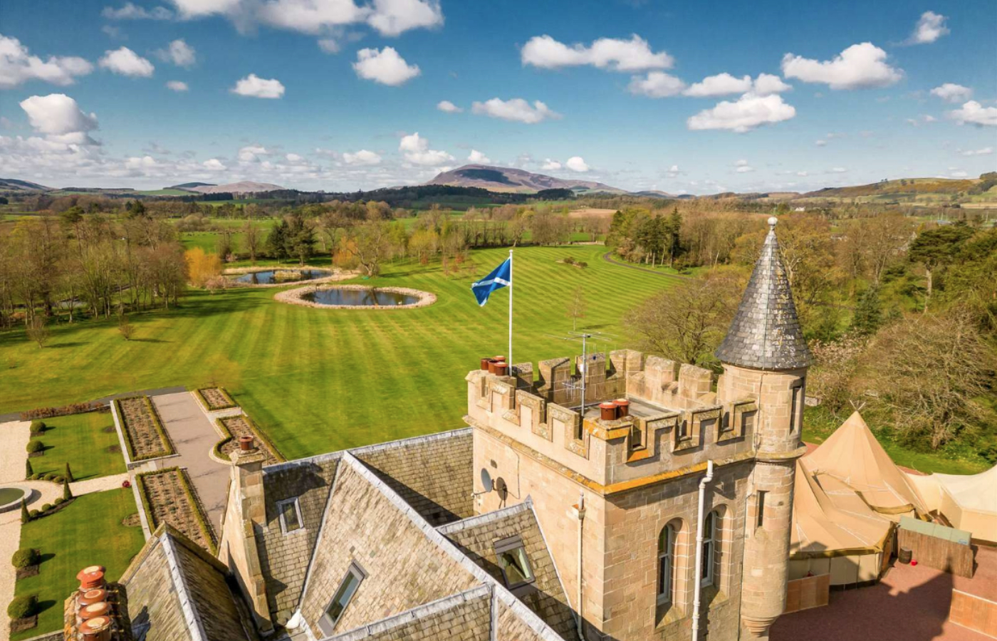 The property retains a tower and battlements dating back to the 14th century. Photo: Savils.