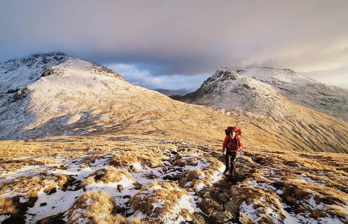 Stranded walker who slid 50m on snowy mountain rescued by helicopter