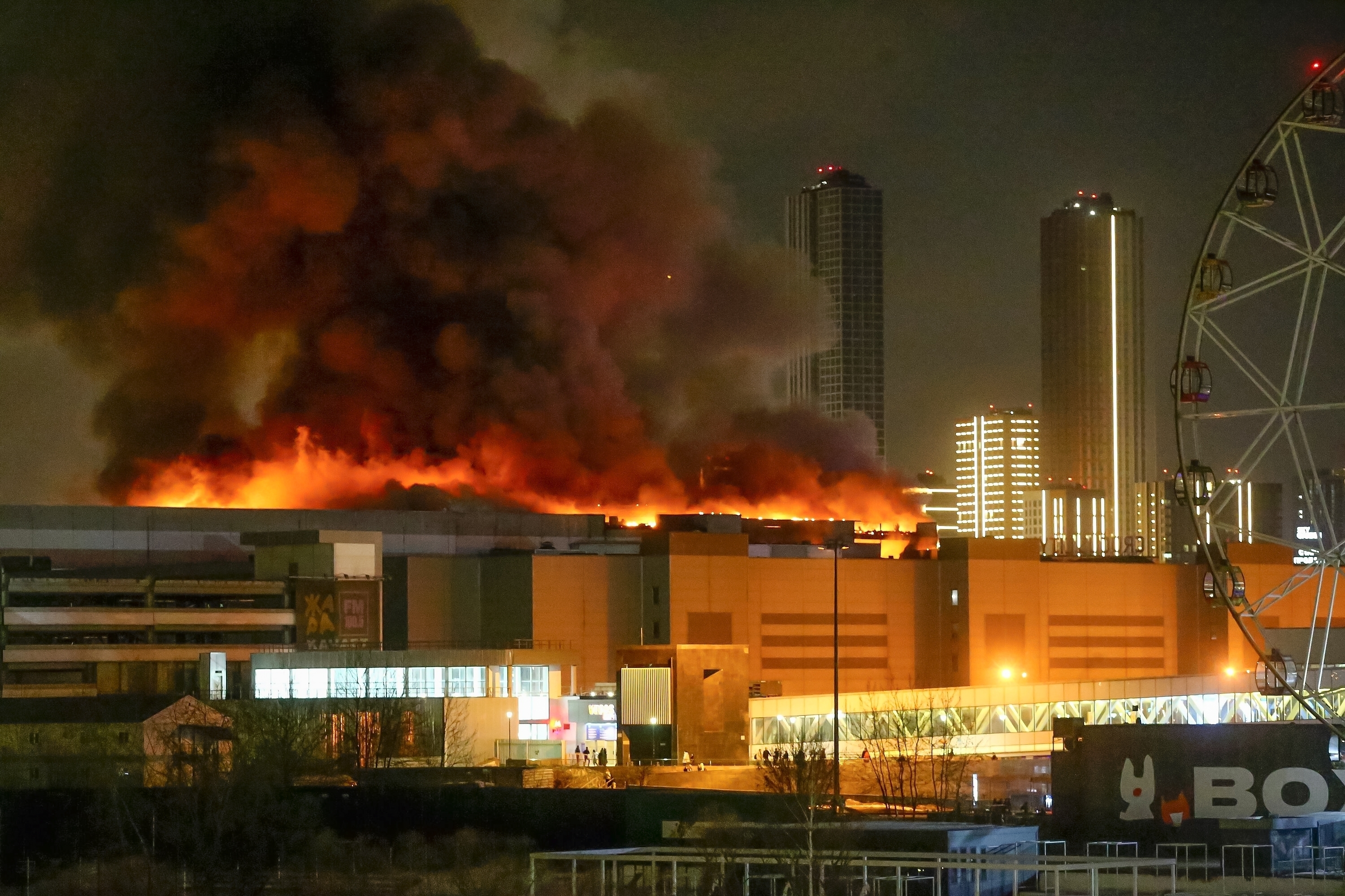A massive blaze is seen over the Crocus City Hall (Sergei Vedyashkin/Moscow News Agency via AP).