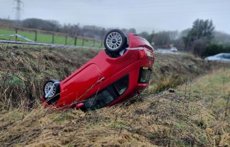 Woman crawled out of wreckage after car flipped into a ditch in Kirkintilloch