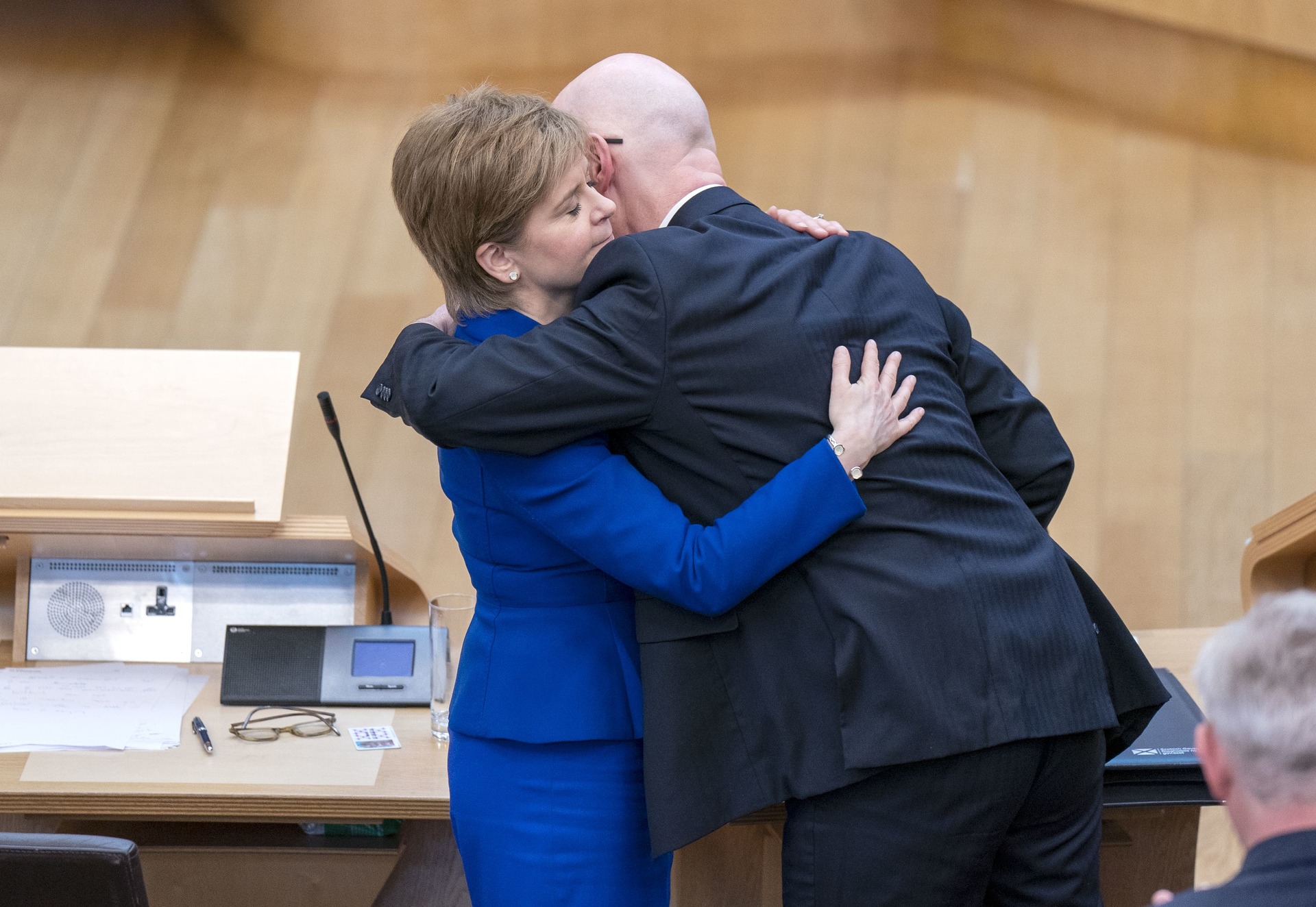 Nicola Sturgeon and John Swinney hug at the former first minister’s last First Minister’s Questions.