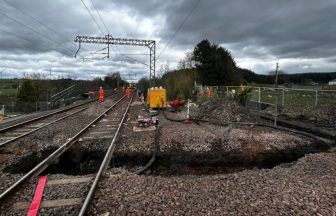 Train line to remain closed after massive sink hole appears under tracks