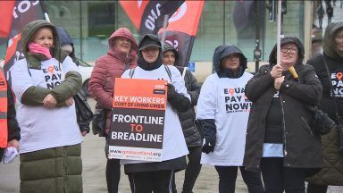 Care workers walk out on strike over better pay