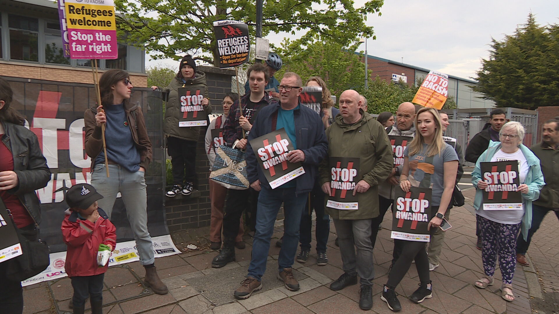 Stand Up to Racism Scotland protesters outside Glasgow Home Office. 