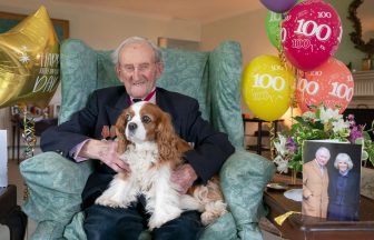 Former Navy chief recalls surviving Nazi raid as he celebrates 100th birthday