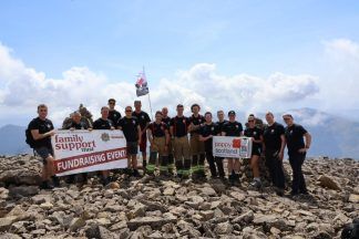 Mountainous challenge sees firefighters summit Ben Nevis in aid of charity