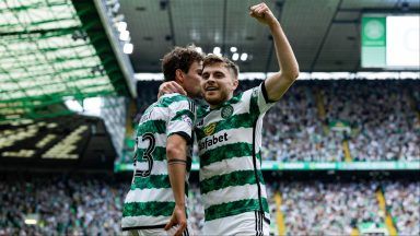 Celtic take massive step towards title with win over ten-man Rangers