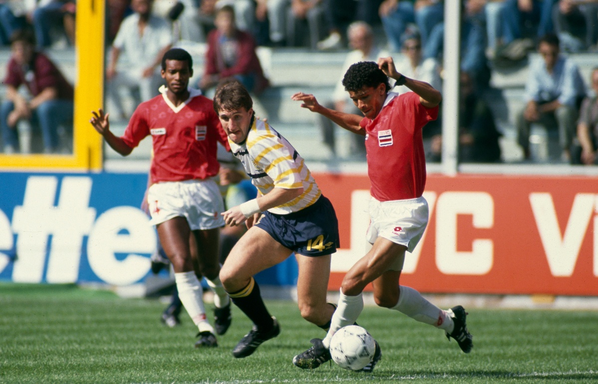 11 June 1990 FIFA World Cup 1990 - Scotland v Costa Rica, Scotland striker Alan McInally (14) tries to regain possession. (Photo by Mark Leech/Getty Images) 