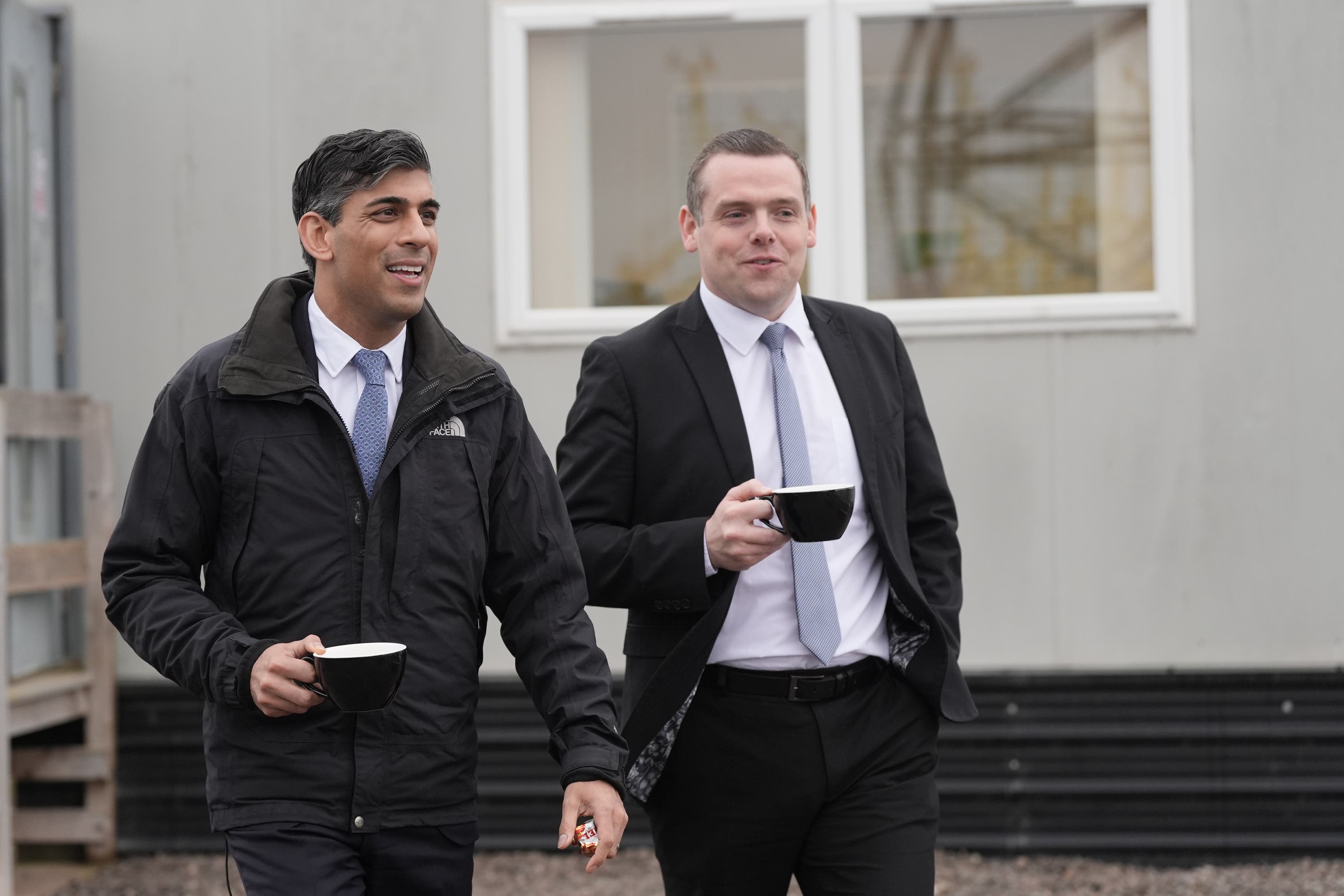 Prime Minister Rishi Sunak, left, said he had enjoyed working with Douglas Ross.