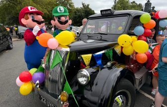 Children treated to day at the seaside on 77th Glasgow Taxi Outing to Troon