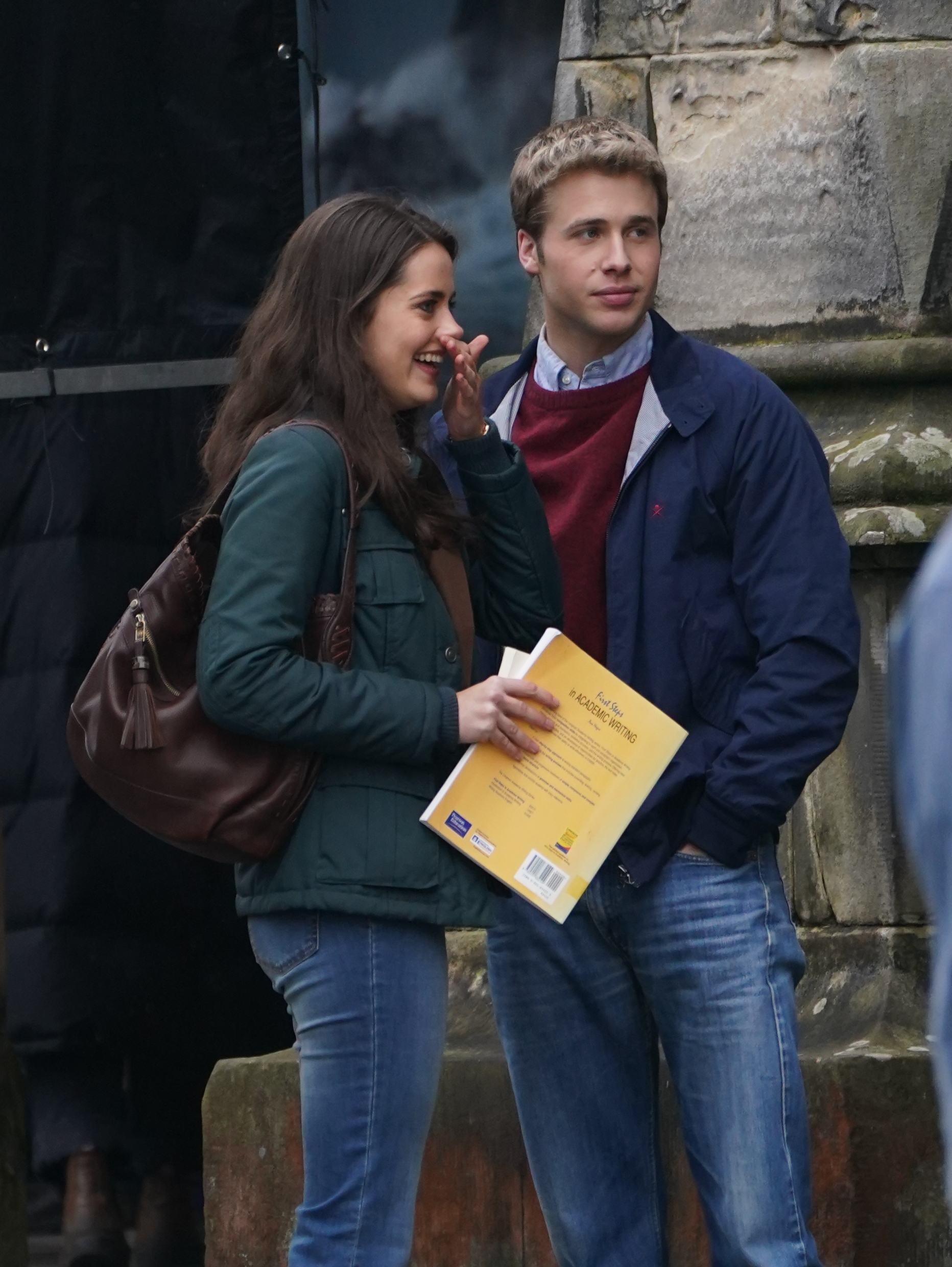 Actress Meg Bellamy, who plays Kate Middleton, and actor Ed McVey, who plays the part of Prince William, film scenes for the next season of The Crown in St Andrews in Scotland. Picture date: Friday March 17, 2023.