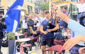 Scots teen attracts crowd at German bar with bagpipe performance alongside Tartan Army