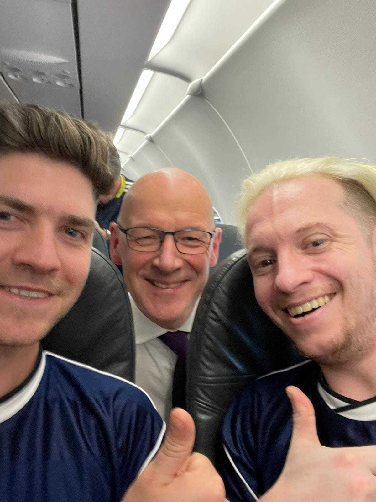 John Swinney snapped by Scotland fans for a selfie on a flight to Munich