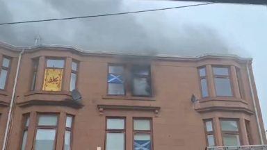 Four in hospital and 22 forced to flee homes amid tenement blaze in Uddingston