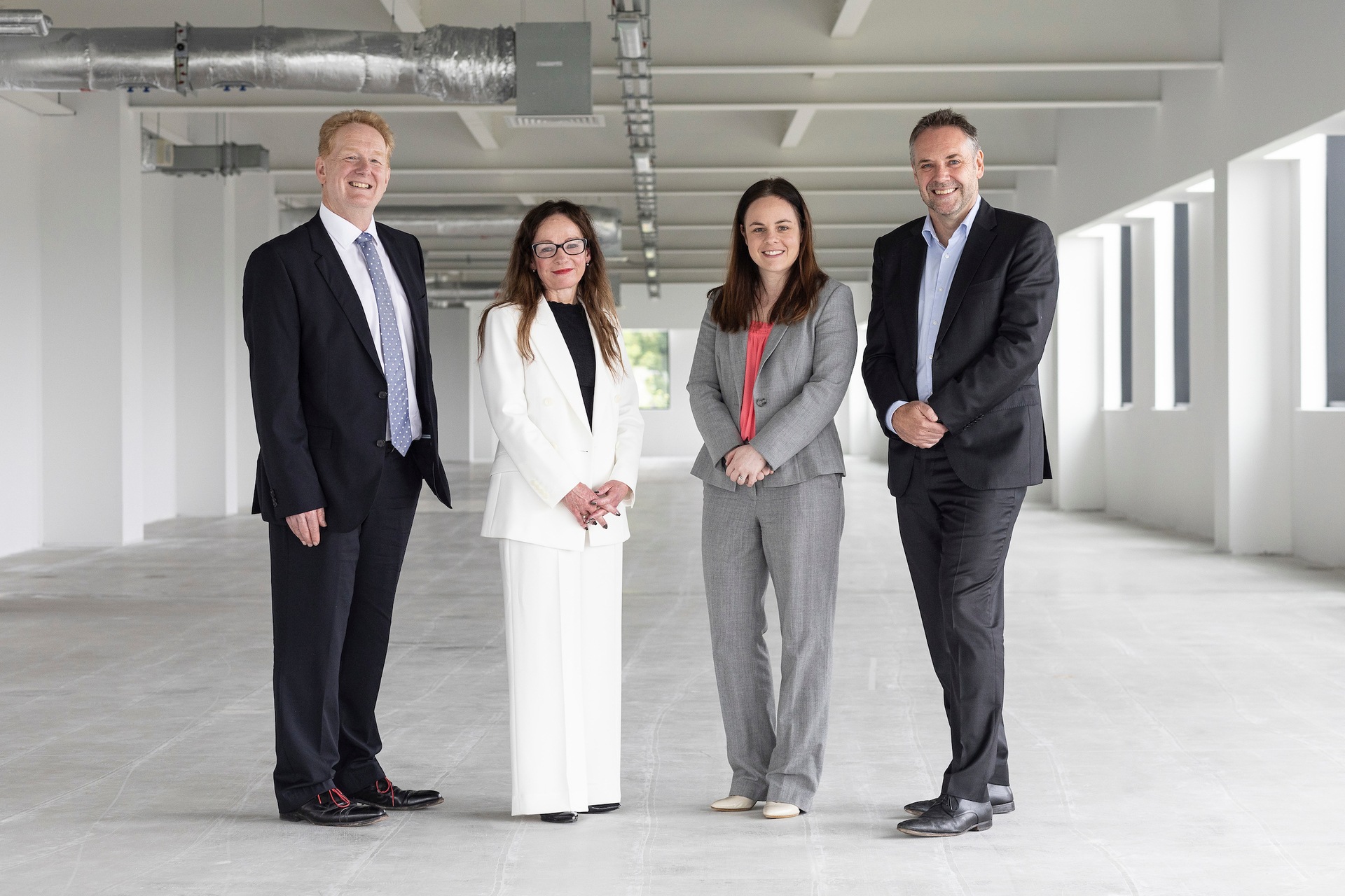 Mark Cook, Deborah O’Neil, Kate Forbes and Craig Ritchie in the space at ONE BioHub that will be fitted out as Scottish Brain Sciences’ clinical trials centre.