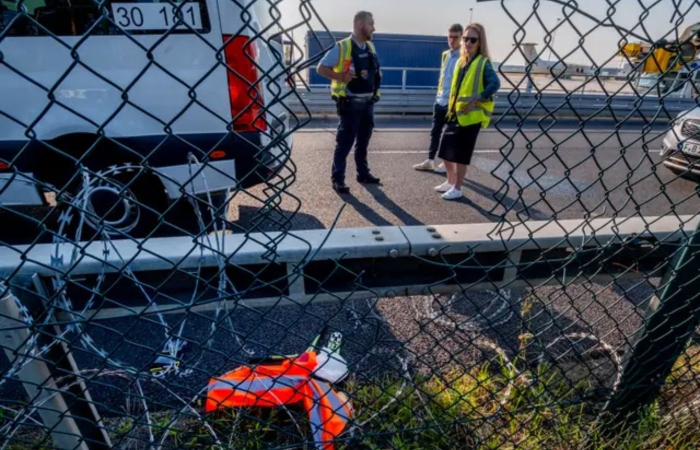 Equipment left behind after a hole was cut in a fence.