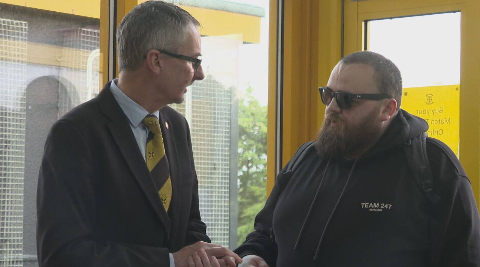 Disability officer Stephen Mill meets Jon Attenborough at East Fife stadium