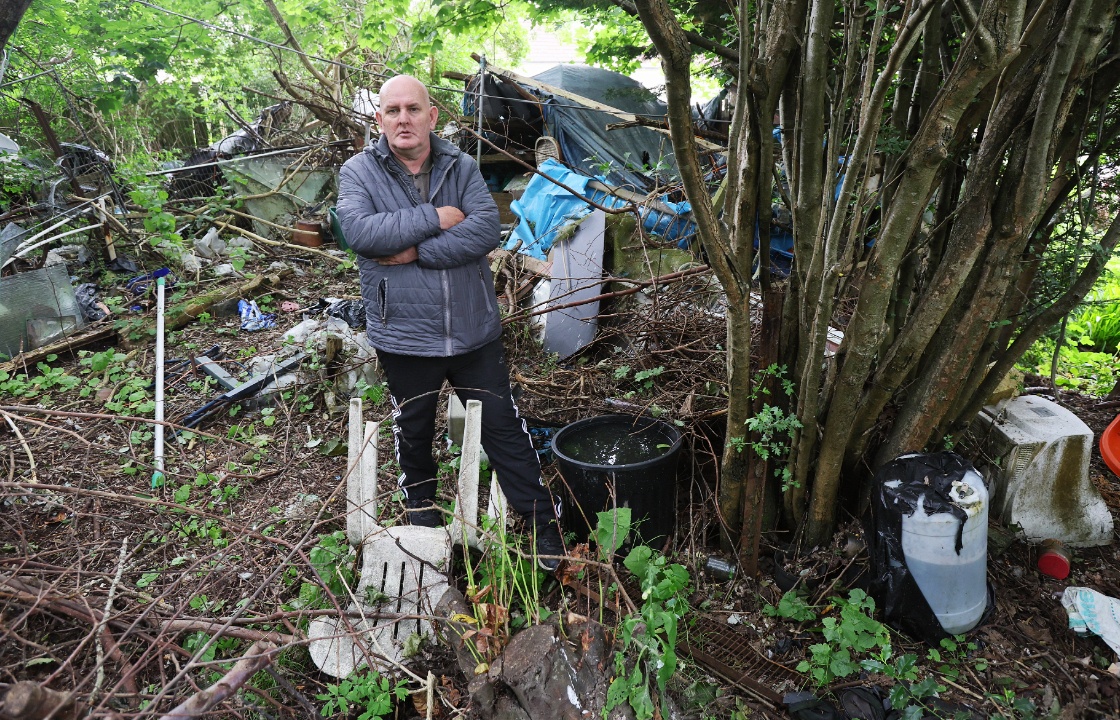 Stuart Henry pictured outside the home of his friend Allan McWilliams in Barrhead.