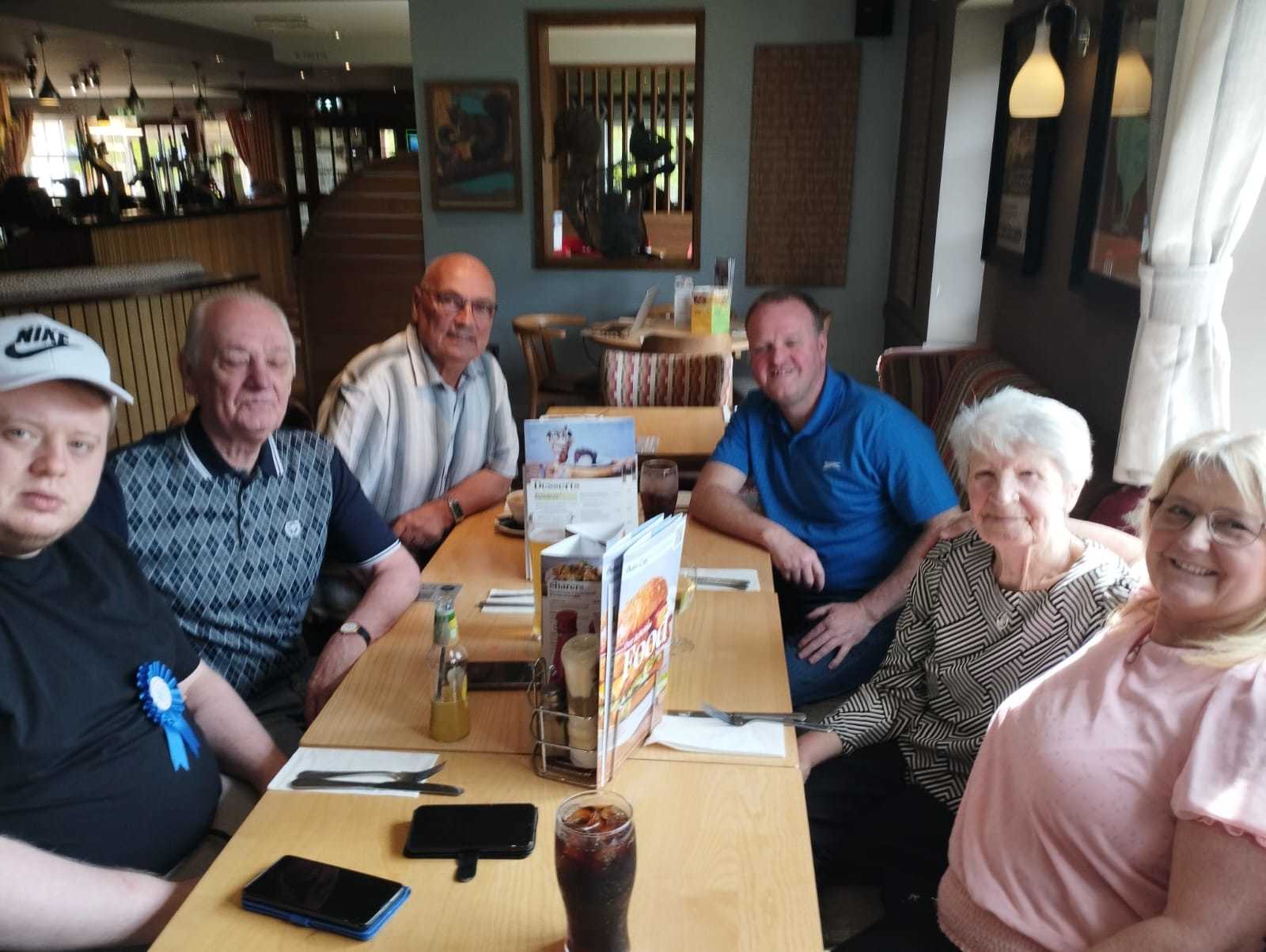 Jamie enjoying a birthday meal with his family.