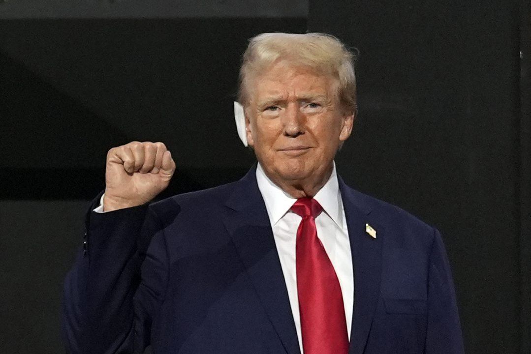 Donald Trump appears with bandaged ear at Republican convention