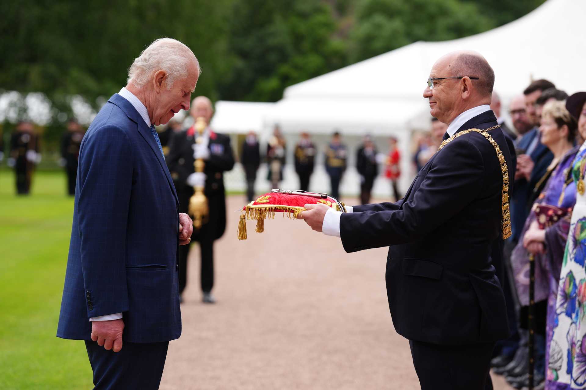 The King receives the keys to the City of Edinburgh from Lord Provost Robert Aldridge at the Palace of Holyroodhouse (Andrew Milligan/PA) 