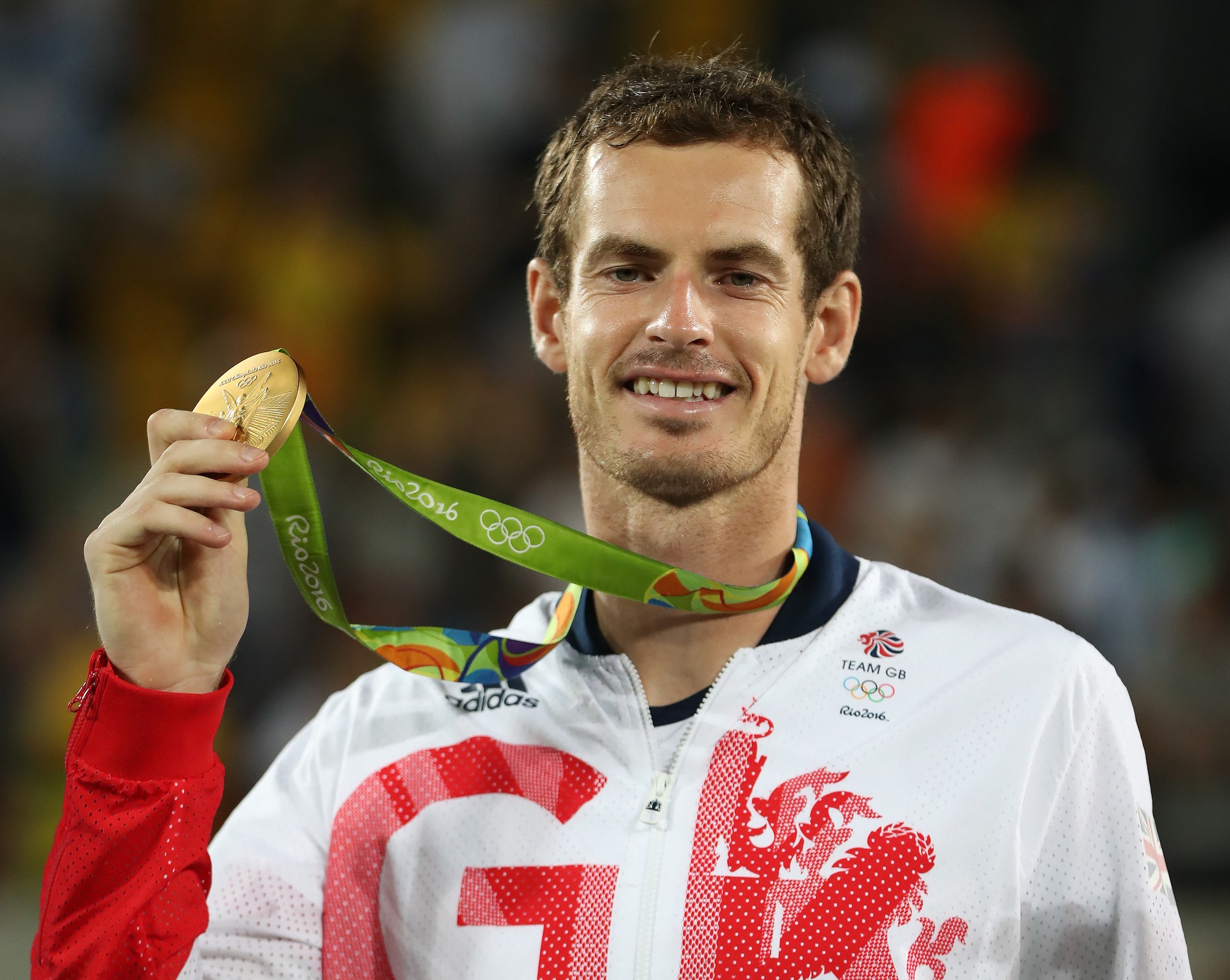 Andy Murray poses with his Gold medal after defeating Juan Martin del Potro of Argentina in the Men's singles final at Olympic Tennis Centre on August 14, 2016 in Rio de Janeiro.