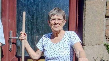 Woman, 75, uses bucket and shovel to fix road potholes outside her home