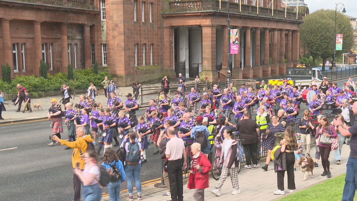 Pipers marched in Glasgow's West End on Monday.