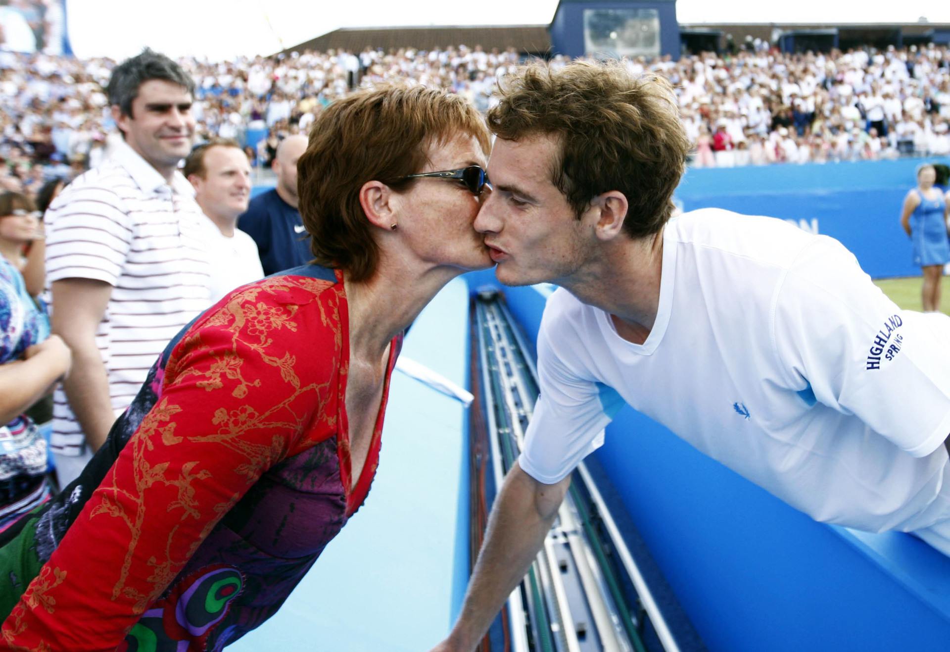 A kiss from mum Judy after Andy Murray wins the AEGON Championships.