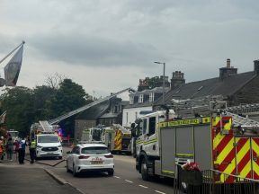 Dozens of firefighters battling blaze at two houses in Moray as A96 closed