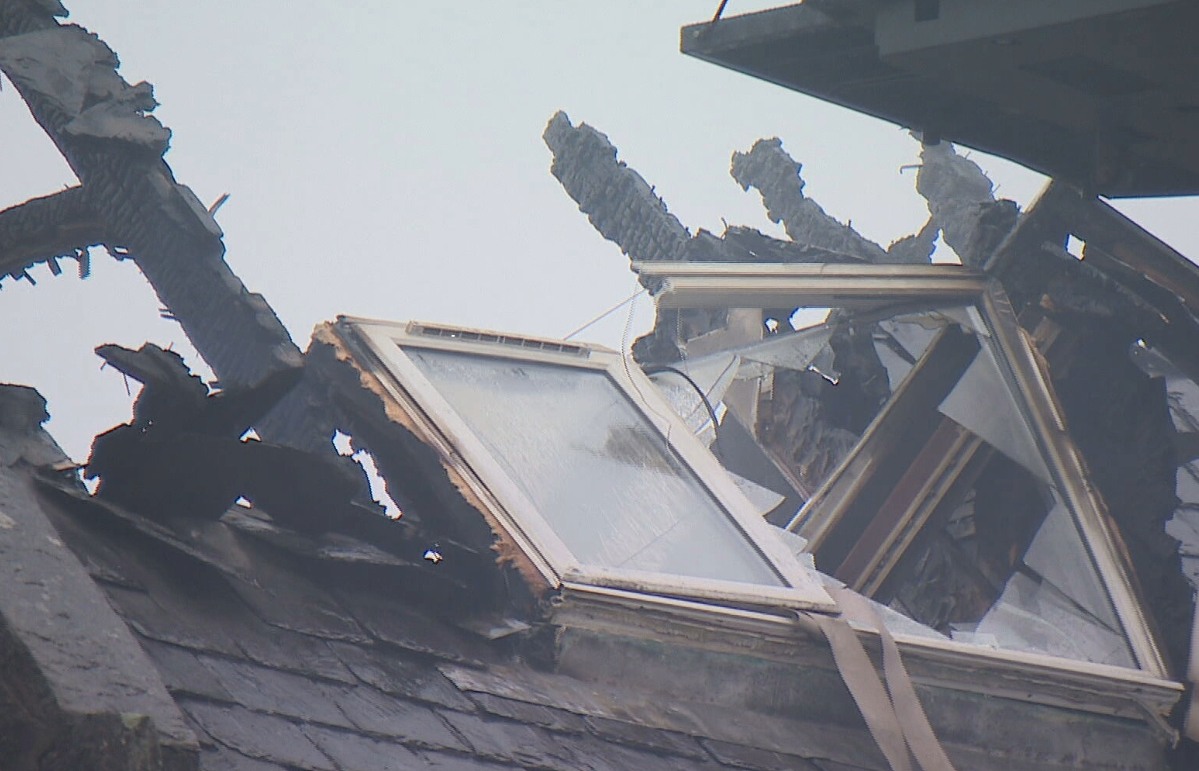 The roof of both properties was left destroyed